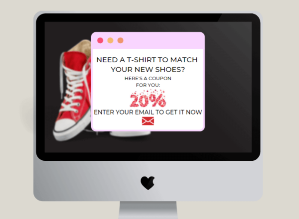 Image on an iMac desktop of a pop-up banner advertisement commonly found on websites and offering a discount to tempt customers.